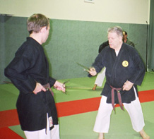 Cours de Kobudo - Maître et élève avec Saï